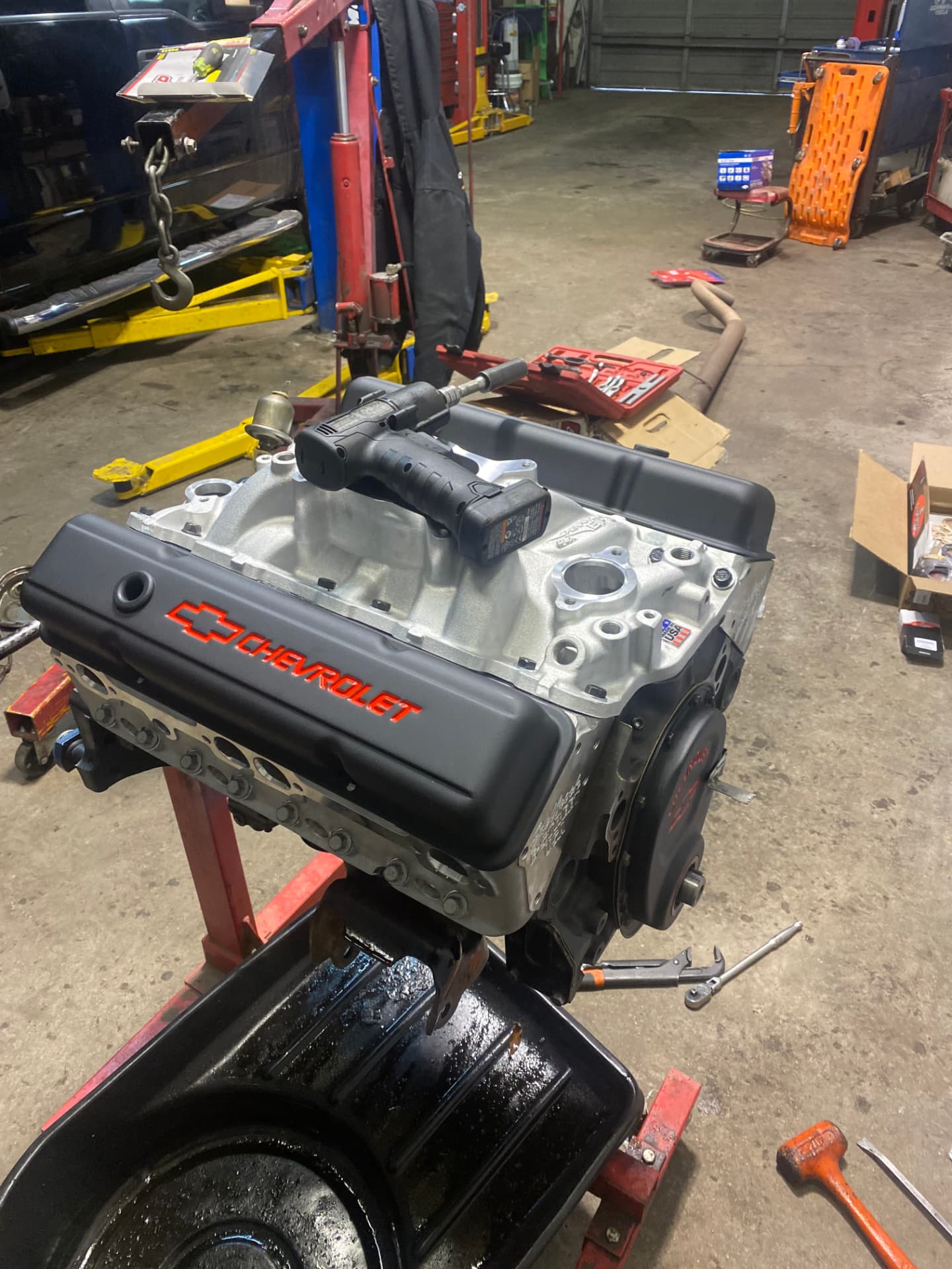 Freshly assembled Chevrolet small-block engine on a stand in the Steiner Auto & Diesel workshop